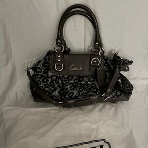 Coach leopard print shoulder bag with included dust bag.